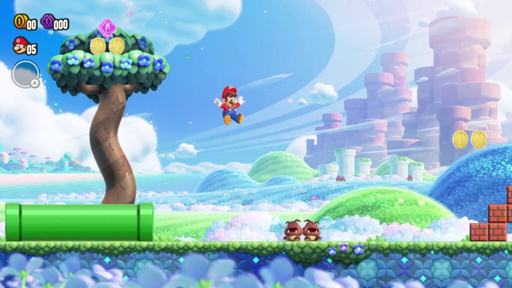 A vibrant scene from Super Mario Bros. Wonder featuring Mario leaping towards a platform with a large tree, with two small brown creatures watching, against a backdrop of a whimsical landscape.
